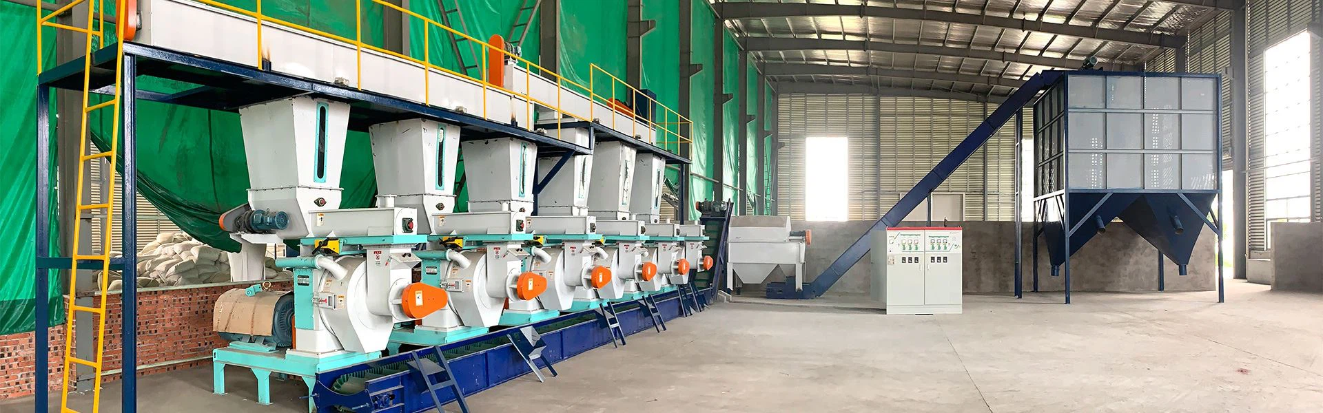 Flat die feed pellet machine